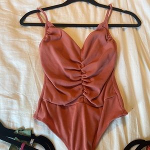 Pinkish brown colored fashion nova bodysuit